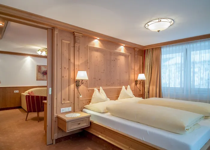 Отель Alpenland 4*